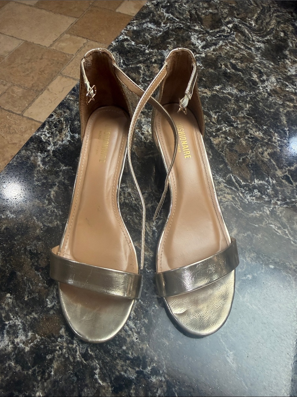 Gold square inch heel